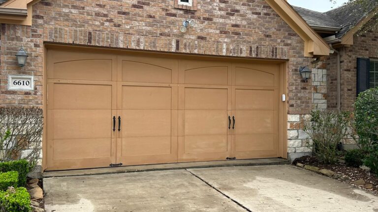 Garage door painting job before spray painting